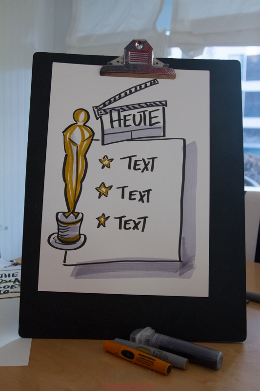 Sandra Dirks - Film-Oscar auf ein Flipchart zeichnen